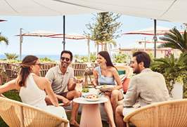 Guests relaxing outdoor at Hotel Excelsior Venice Lido Resort