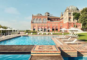 The outdoor pool of Hotel Excelsior Venice Lido, luxury hotel in Venice, Italy