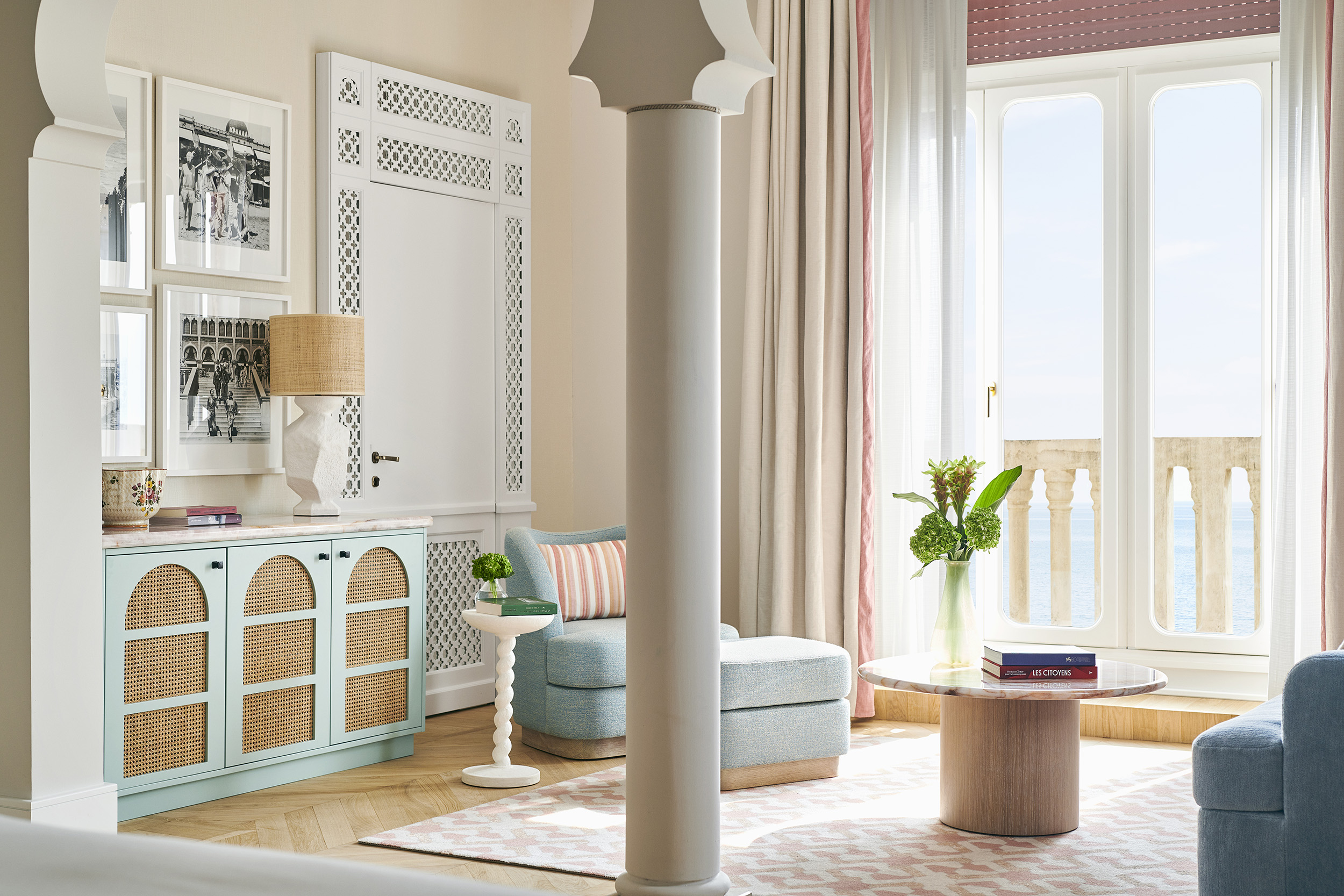 Pastel-toned venetian luxury suite with private balcony and Adriatic views, a serene escape among Venice suites.